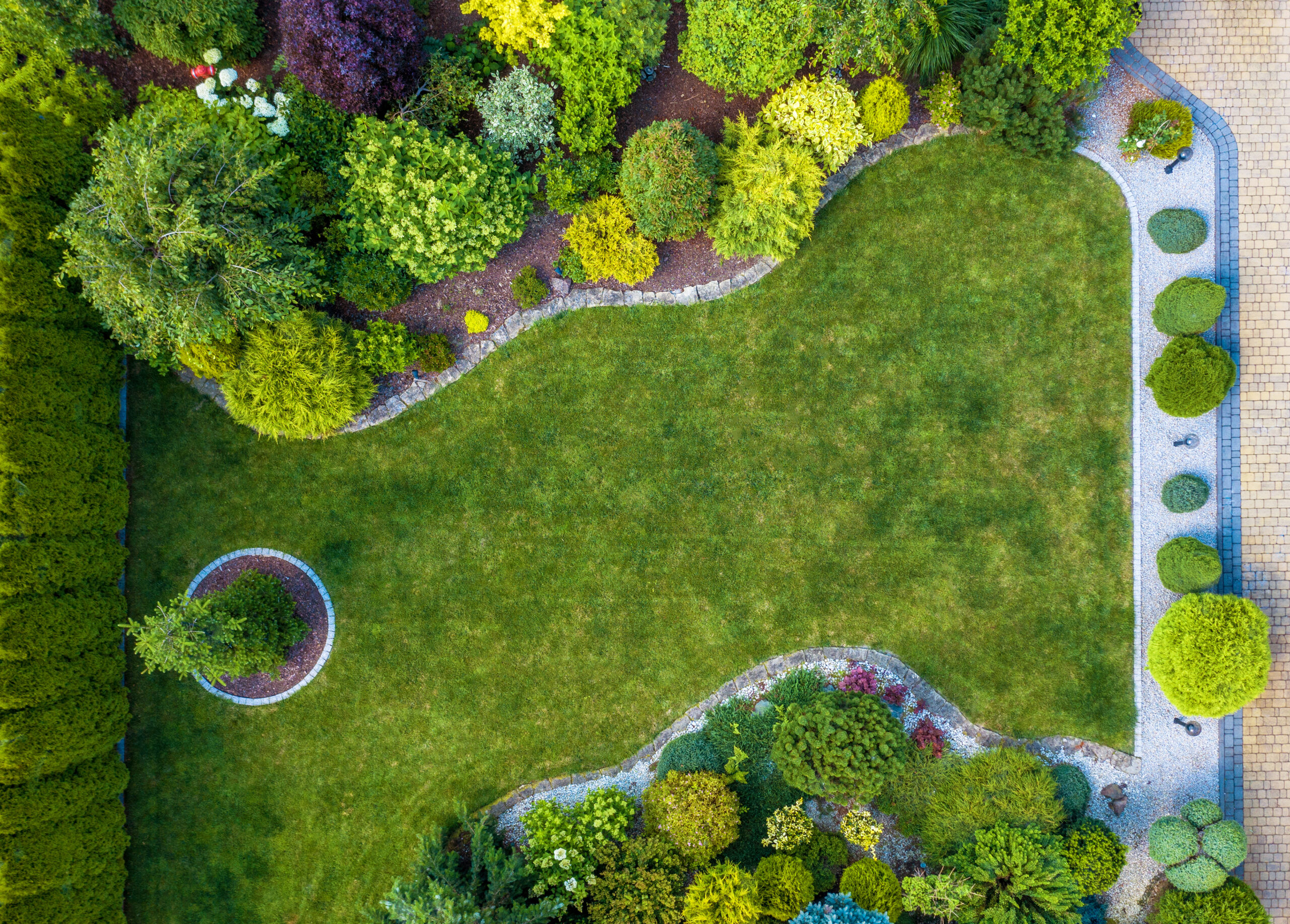 Beautiful Residential Mature Garden Aerial Top View Landscaping Industry Theme.
